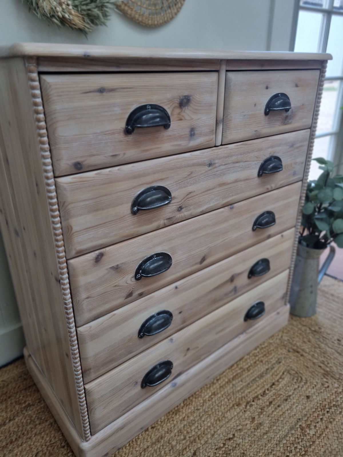 Rustic pine chest of drawers with bobbin detailing