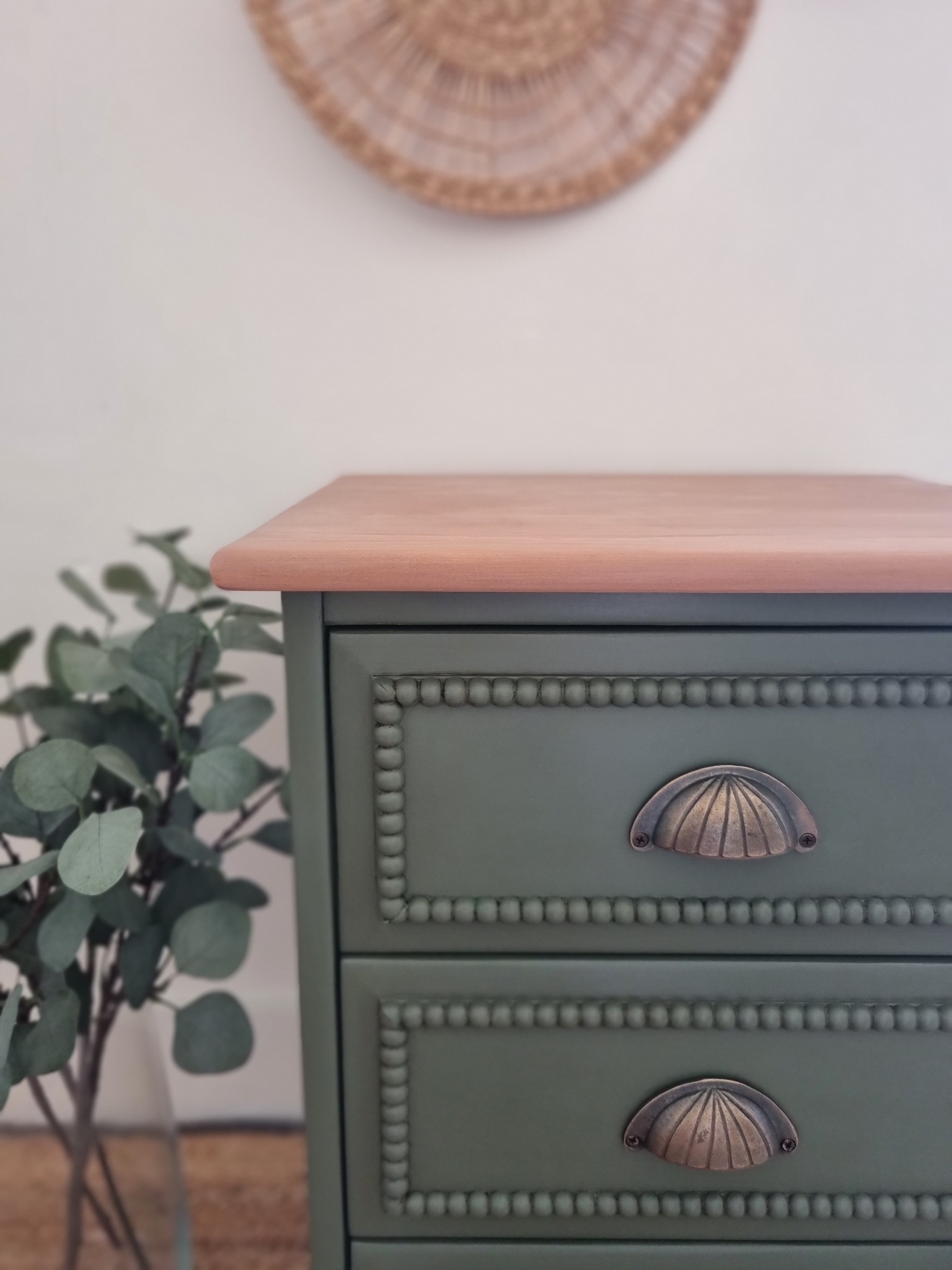 Green bobbin drawers with bronze cup handles