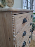 Rustic pine chest of drawers with bobbin detailing