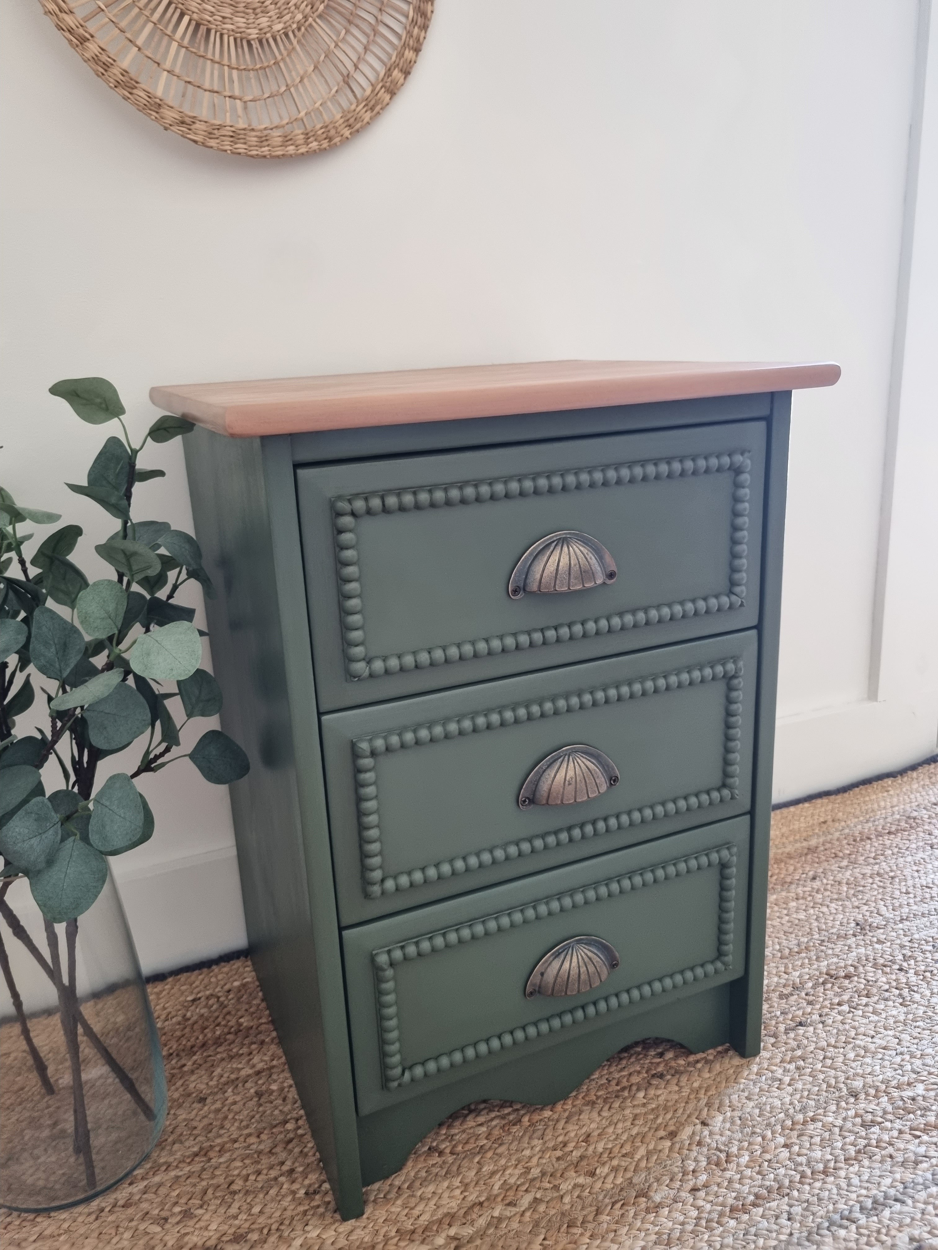 Green bobbin drawers with bronze cup handles
